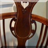 F42. Antique round chair on casters. 37”h x 22”w x 20”d 